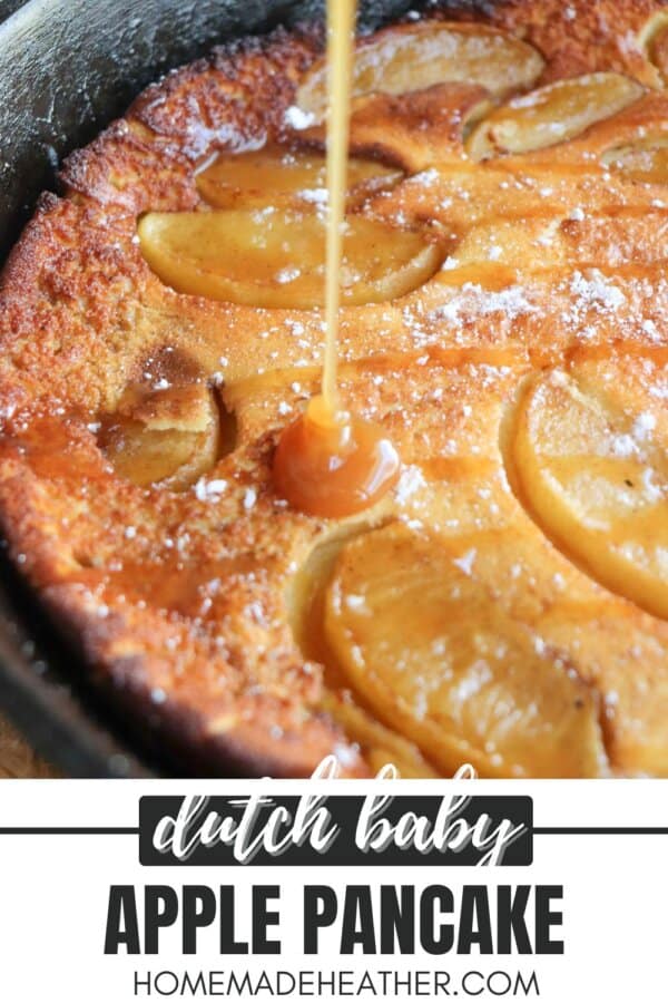 Caramel being drizzled onto an apple dutch baby in a cast iron skillet.