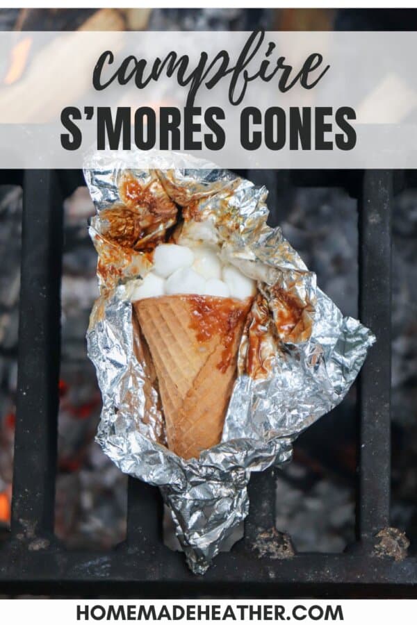 Sugar cone topped with chocolate and marshmallows wrapped in foil.