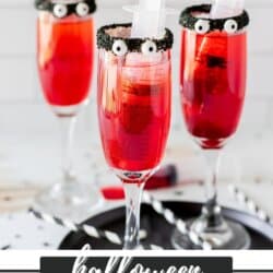 Champagne glasses with black frosting on the rim, candy eyes and sprite died red with a syringe full of food grenadine.