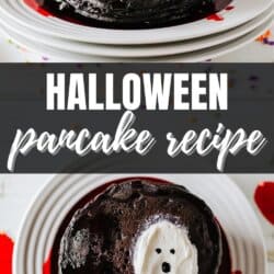 Black pancakes stacked on a white plate with a white frosting ghost on top.