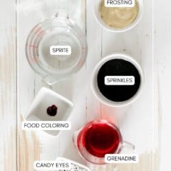 Ingredients for monster mocktails in dishes on a white table.