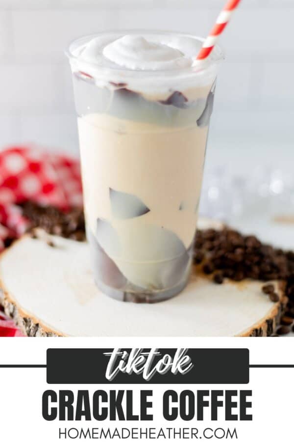 Coffee with cream in a plastic cup with cracked chocolate and whipped cream.