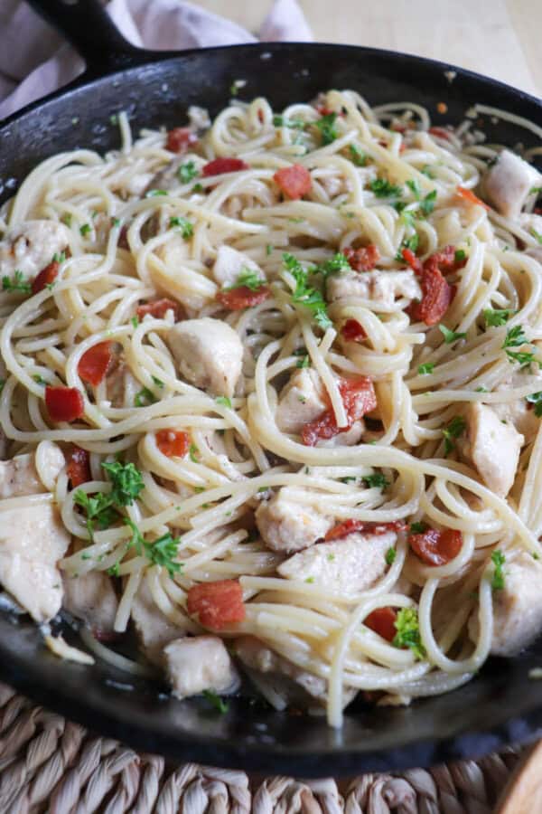 Chicken spaghetti in a cast iron skillet.