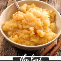 Apple sauce in a white bowl on a wooden table.