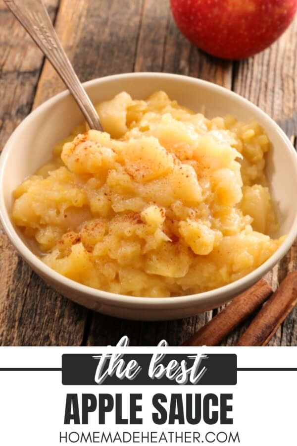 Apple sauce in a white bowl on a wooden table.