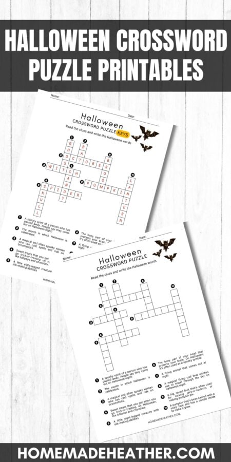 nature printable bingo sheets Halloween crossword printables on a white flat lay.