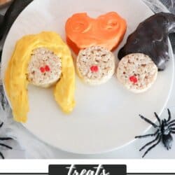 Rice krispie treats in the shape of Hocus Pocus characters on a white plate.