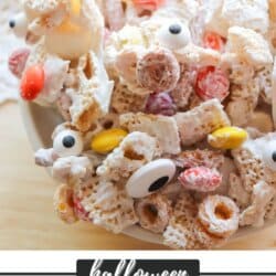 Pretzels, cheerios and chex covered in white chocolate with candy eyes, candy corn and M&Ms.