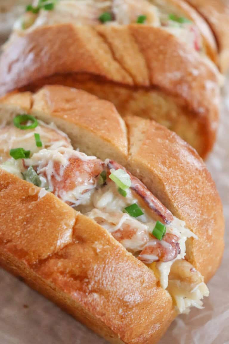 Indulge in the ultimate crab roll recipe experience! Fresh, West Coast crab meat, zesty mayo and fresh veggies all packed into a garlic buttery roll.