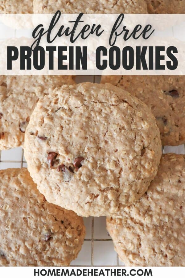 Large oatmeal chocolate chip cookies stacked on one another.