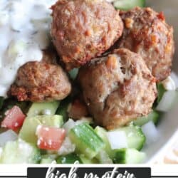 Meatballs in a bed of rice with tzatziki and diced cucumber.