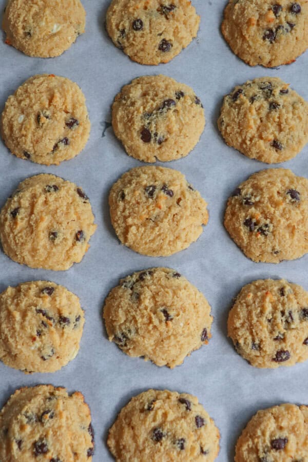 Cottage cheese chocolate chip cookies on a sheet of parchment paper.