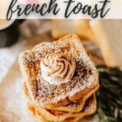 A stack of eggnog French toast dusted with powdered sugar and topped with a dollop of whipped cream. The text reads Eggnog French Toast and homemadeheather.com is at the bottom.