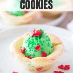 Sugar cookie cup with green pudding center topped with red candy hearts.