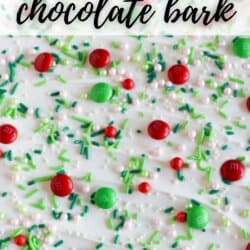 White chocolate bark with white and green sprinkles and red and green m&ms.