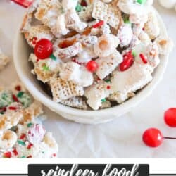 Chex mix and cheerio cereal topped with white chocolate, festive sprinkles and red and green m&ms.