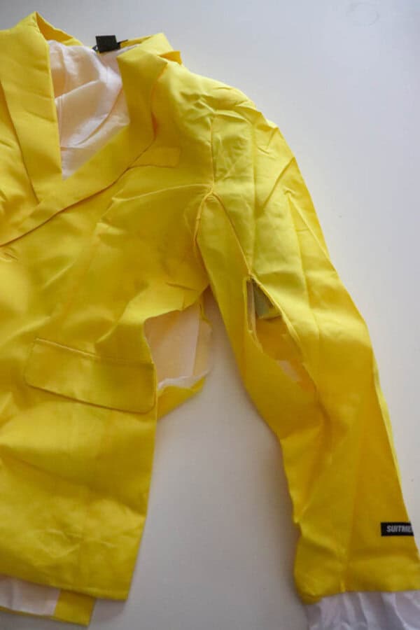 plague doctor costume Yellow suit with cuts in the side and arms for a Bob shrunken head costume.