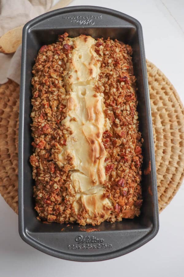 Cream cheese pumpkin bread in a loaf pan.