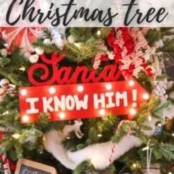 Christmas tree decorated with ornaments, candy canes, and a red and white sign that reads Santa, I know him! The text at the top says Buddy the Elf Christmas Tree. The tree is festive and colorful.