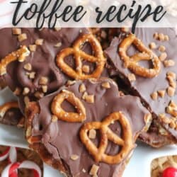 Close-up of chocolate-covered toffee topped with pretzels and toffee bits on a white plate. The text PRETZEL toffee recipe is overlaid at the top. Candy canes are scattered around the plate.