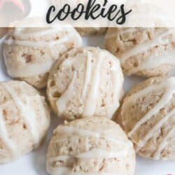 A plate of round eggnog cookies drizzled with icing, arranged neatly. The background features a festive, red and white holiday theme. Text at the top reads EGGNOG cookies and at the bottom HOMEMADEHEATHER.COM.