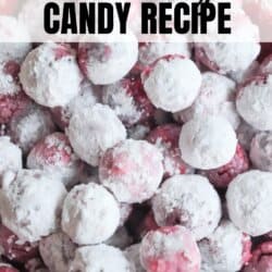 A close-up of cranberry candies coated in powdered sugar is displayed. The image text reads "Delicious Cranberry Candy Recipe" with a website link below to homemadeheather.com.