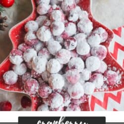 A Christmas tree-shaped dish brimming with delightful cranberry candy, surrounded by fresh cranberries and festive decorations. Text reads Cranberry Candy Recipe, inviting you to discover the magic at homemadeheather.com.