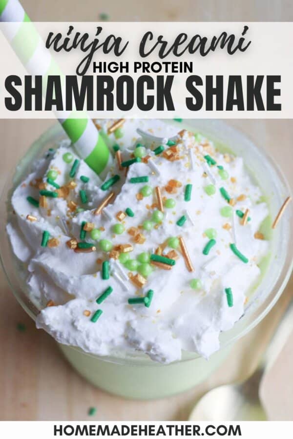 A creamy shake topped with whipped cream, green and gold sprinkles, and a green-striped straw. Text reads Ninja Creami High Protein Shamrock Shake at the top and homemadeheather.com, showcasing an irresistible shamrock shake Ninja recipe.