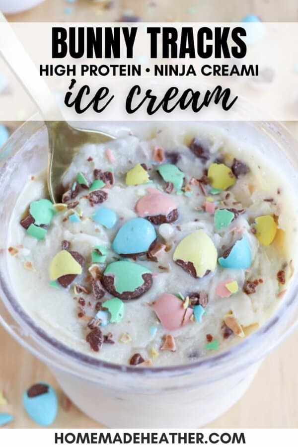 A bowl of Bunny Tracks ice cream topped with colorful chocolate eggs and chocolate pieces. Text on the image reads: Bunny Tracks High Protein Ninja Creami Ice Cream. At the bottom, it says homemadeheather.com.