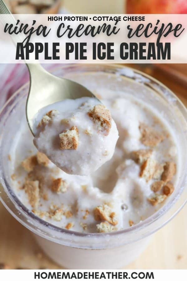 Spoonful of apple pie ice cream topped with crumbled pieces, held over a container. The label reads ninja creami recipe, high protein, cottage cheese, apple pie ice cream. The bottom has the URL homemadeheather.com.