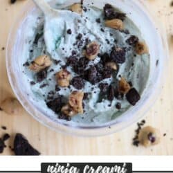 A bowl of blue cookie dough ice cream with mixed chocolate cookie crumbles and chocolate chip pieces on top. The text at the bottom reads Ninja Creami Cookie Monster with a website URL homemadeheather.com.