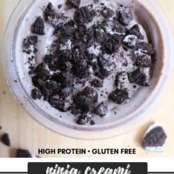 A top view of a bowl filled with Oreo ice cream topped with crumbled Oreo cookies. The text on the image reads High Protein • Gluten Free, Ninja Creami, Oreo Ice Cream, and homemadeheather.com.