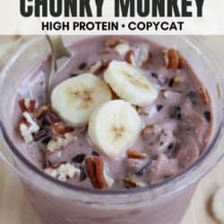 A cup of chunky monkey ice cream topped with banana slices, chocolate chunks, and pecans. The text reads ninja creami CHUNKY MONKEY HIGH PROTEIN โข COPYCAT.