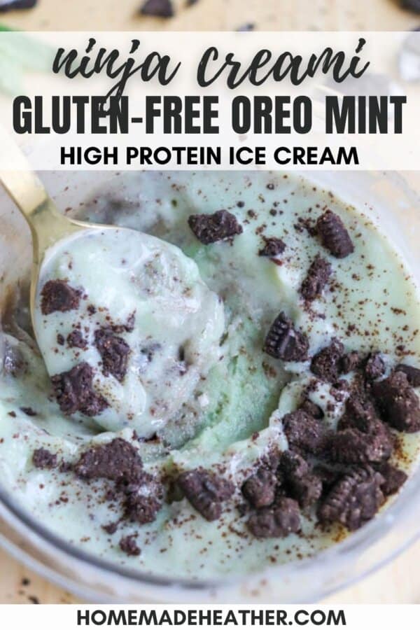 A bowl of high protein ice cream with a mint flavor, topped with crumbled gluten-free Oreo cookies. A spoon is in the bowl. Text at the top reads: ninja creami GLUTEN-FREE OREO MINT HIGH PROTEIN ICE CREAM and HOMEMADEHEATHER.COM at the bottom.