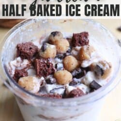 A tub of half-baked ice cream is filled with chunks of cookie dough and brownie pieces. The lid displays text about the ice cream being high protein and low carb, labeled as ninja creami.