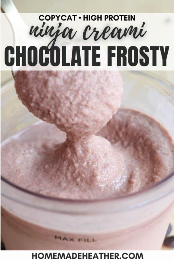 A spoon scooping a thick, creamy, chocolate frosty from a glass container labeled MAX FILL. The text on the image reads Copycat High Protein Ninja Creami Chocolate Frosty and homemadeheather.com at the bottom.