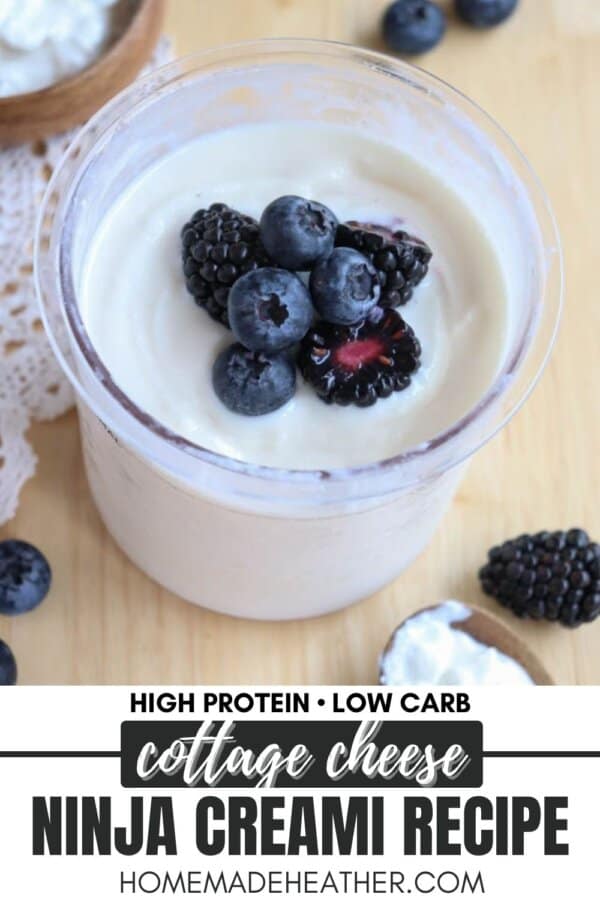 A cup of creamy cottage cheese topped with fresh blackberries and blueberries. The text reads High Protein • Low Carb and Cottage Cheese Ninja Creami Recipe with homemadeheather.com below.