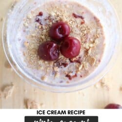 A bowl of cherry cheesecake ice cream topped with three cherries and crushed graham crackers. The text Ice Cream Recipe, Ninja Creami Cherry Cheesecake is shown on a label with the website homemadeheather.com below.