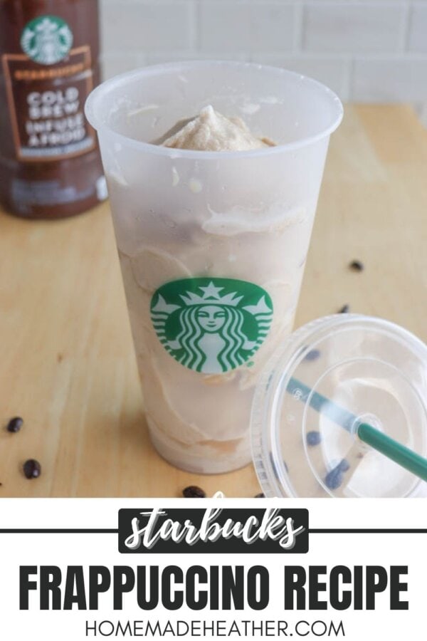 A Starbucks cup filled with a blended coffee drink sits on a table. The lid is off to the side, with coffee beans scattered nearby. In the background, there is a Starbucks bottle labeled Cold Brew Coffee Concentrate. Text reads Starbucks Frappuccino Recipe.