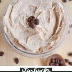 A bowl of creamy coffee ice cream topped with coffee beans is placed on a wooden surface. Scattered coffee beans surround the bowl. The text below reads Starbucks Coffee Ice Cream with a website URL.