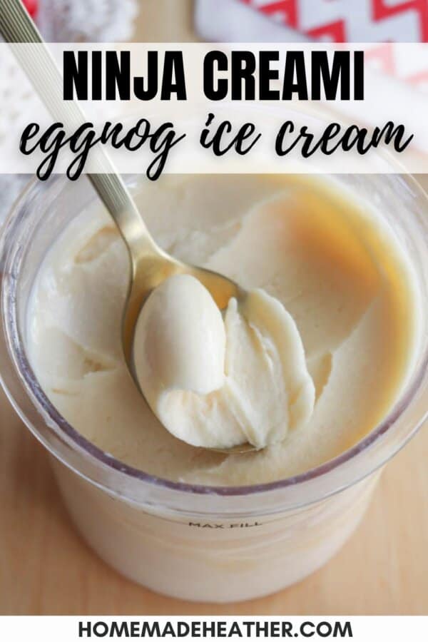 A spoon scoops creamy eggnog ice cream from a clear container. Text above reads Ninja Creami eggnog ice cream and below is the website homemadeheather.com.