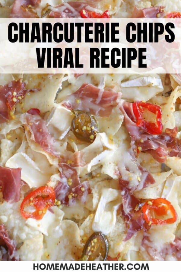 Close-up of a charcuterie chips dish, featuring melted cheese, sliced meats, jalapeños, and red pepper slices on top of chips. Bold text reads Charcuterie Chips Viral Recipe at the top and homemadeheather.com at the bottom.