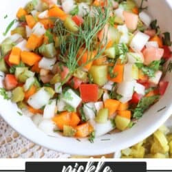 A white bowl filled with colorful diced vegetables including pickles, tomatoes, onions, and peppers, garnished with fresh dill. The text overlay reads Pickle De Gallo Recipe and homemadeheather.com.