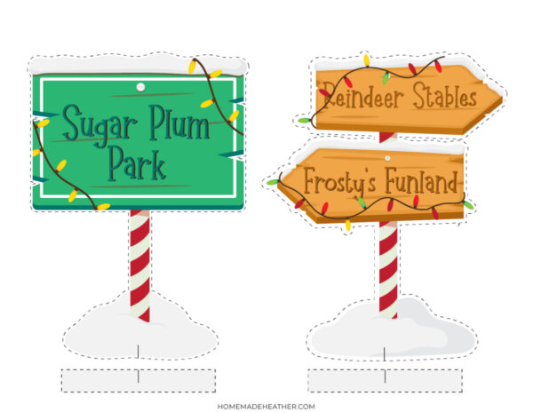 Two festive holiday signs with string lights: one green sign reads Sugar Plum Park, and two yellow arrow signs read Reindeer Stables and Frostys Funland, all in snow with candy cane-striped poles.