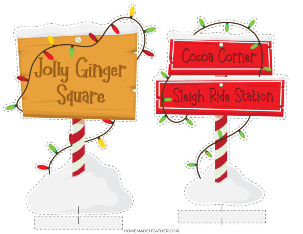 Two festive signs with Christmas lights and snow. One reads Jolly Ginger Square on wood, the other has two red arrow signs labeled Cocoa Corner and Sleigh Ride Station on a candy cane pole.