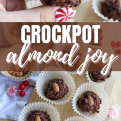 Overhead view of homemade chocolate almond joy clusters with whole almonds on top, placed in white paper cups, with a hand holding one piece. Text reads Crockpot Almond Joy and homemadeheather.com.