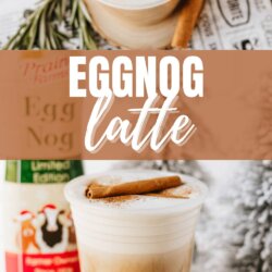 A creamy eggnog latte in a clear cup, topped with whipped cream, cinnamon, and a cinnamon stick. The background includes rosemary, a snowy tree, and an eggnog carton. Text reads EGGNOG latte and homemadeheather.com.