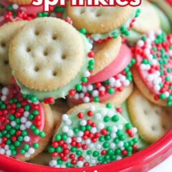 A red bowl filled with mini Ritz cracker sandwiches, some dipped in white or green chocolate and decorated with red, white, and green sprinkles. Text reads mini ritz sprinkles and SO GOOD at the bottom.