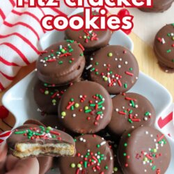 A star-shaped dish filled with chocolate-covered Ritz cracker cookies topped with red, green, and white sprinkles. A bitten cookie shows a creamy peanut butter filling inside. Striped napkins and more cookies are nearby.