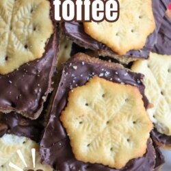 A close-up of chocolate-covered toffee topped with snowflake-shaped Ritz crackers, arranged in a festive pile. Text on the image reads: ritz cracker toffee and SO FESTIVE! homemadeheather.com.